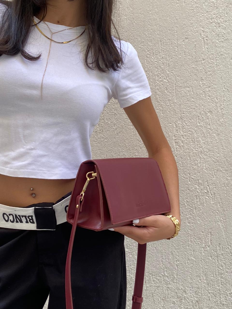 Burgundy | The triangular crossbody Bag