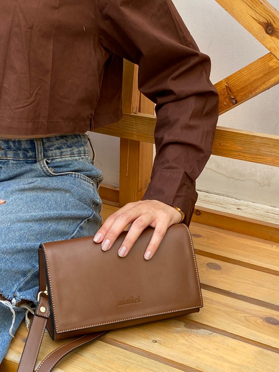 Brown | The triangular crossbody Bag