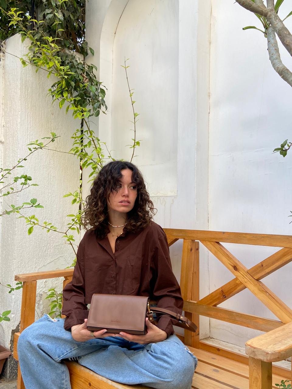 Brown | The triangular crossbody Bag